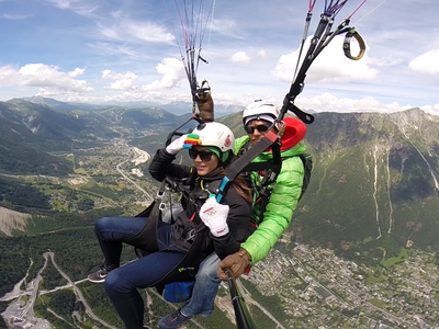 Tandem paragliding flight facing the Mont-Blanc, Chamonix Tandem paragliding flight facing the Mont-Blanc, Chamonix